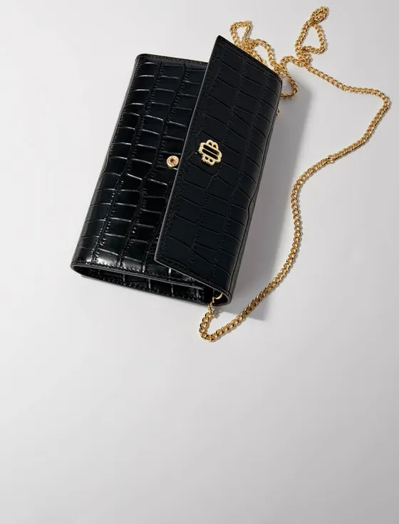 T&uacute;i clutch da b&oacute;ng v&acirc;n da c&aacute; sấu