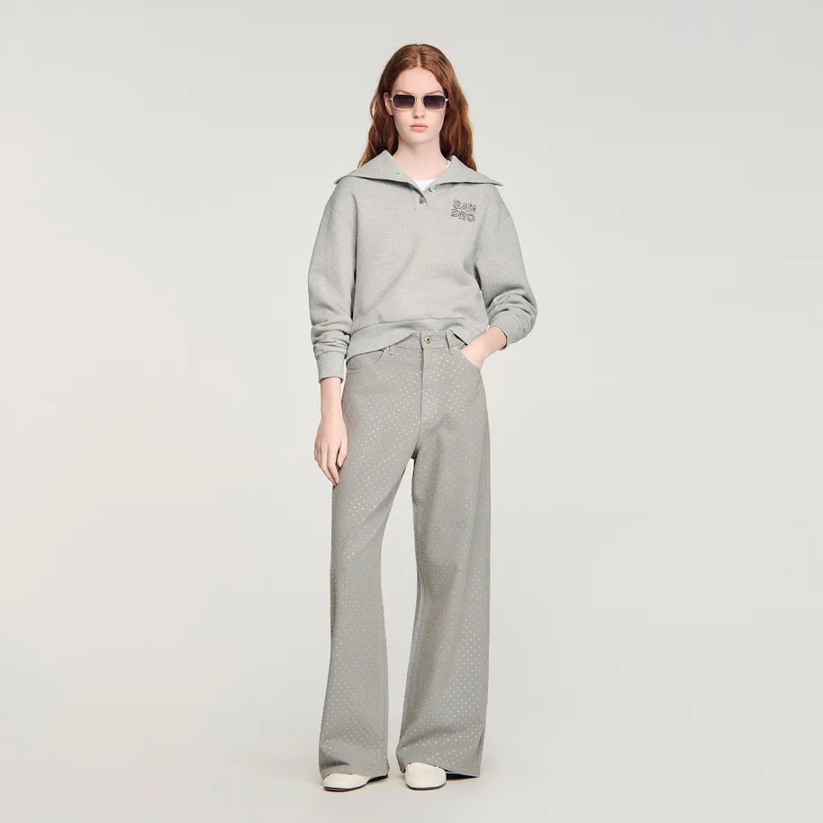 Quần jeans đính đá