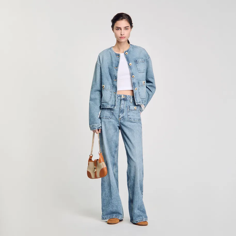 Quần jeans phối khuy